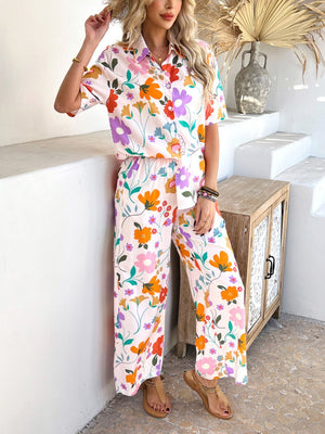 Women's abstract print resort co-ord set with button-up shirt and wide-leg pants in multicolor floral.