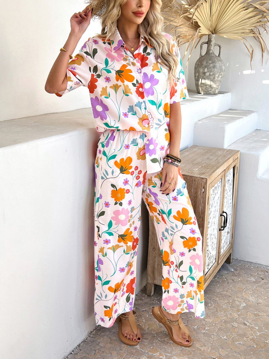 Women's abstract print resort co-ord set with button-up shirt and wide-leg pants in multicolor floral.