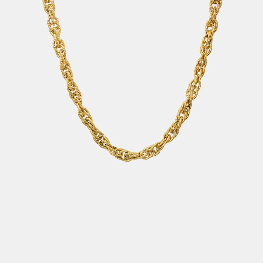 Gold textured rope chain necklace with intricate woven links.