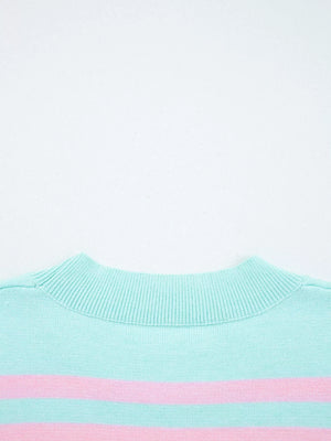 Multicolor striped cropped sweater with a ribbed mock neck.