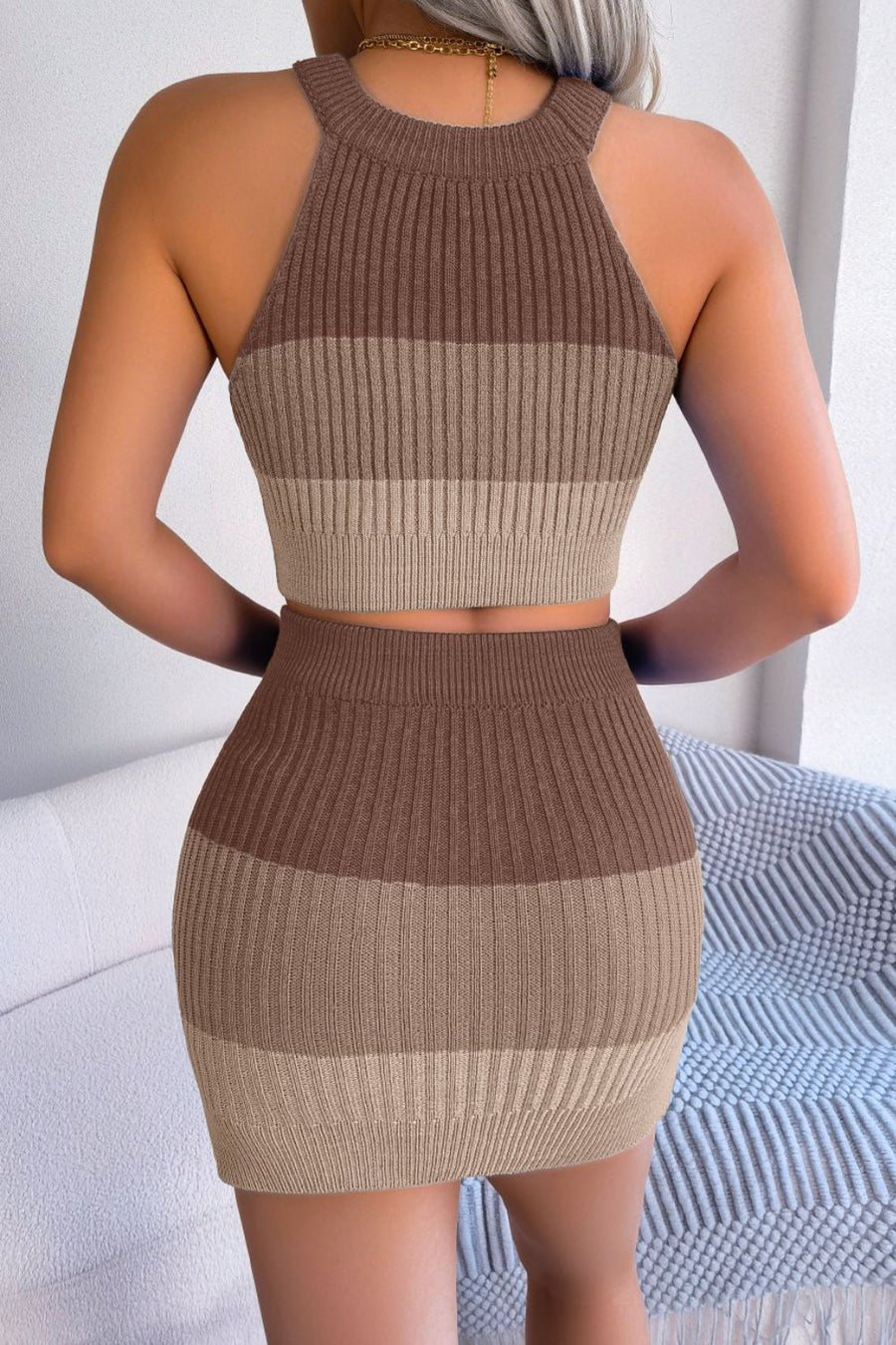Ribbed halter crop top and mini skirt set in camel with horizontal stripes.