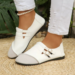 slip-ons in white featuring round toe and flat fit