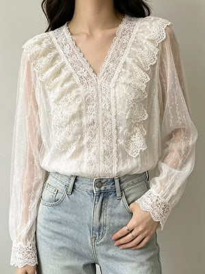 ivory blouse with polka dot and v-neck