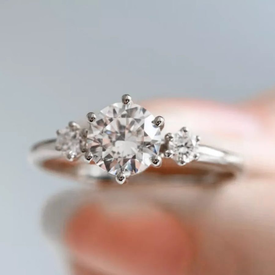 925 sterling silver,Moissanite Care instructions: Avoid wearing during exercise, ring in clear with fitted silhouette