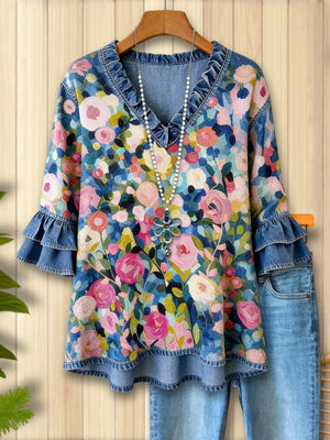 pink blouse with floral and v-neck