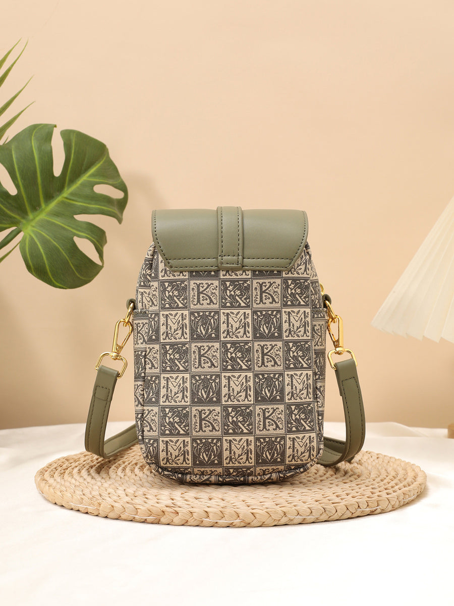crossbody bag in cream with geometric and flap closure