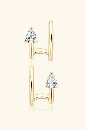 Gold ear cuff with a pear-shaped diamond accent