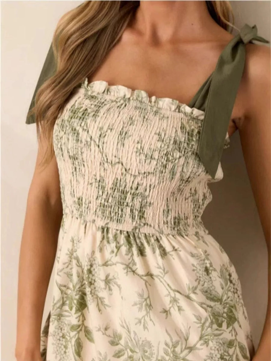 Floral midi dress with smocked bodice and tie straps