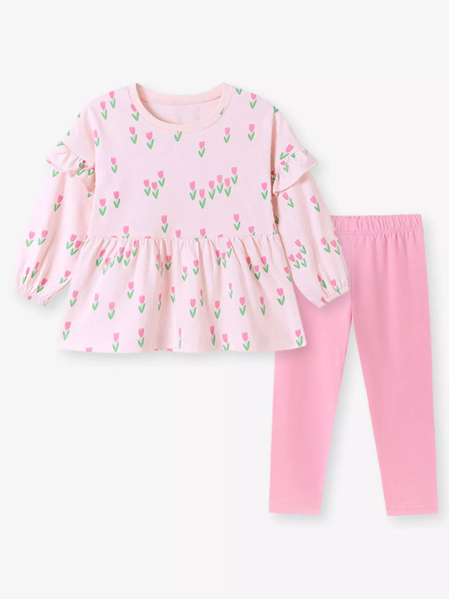 Pink peplum top and leggings set featuring ruffles and floral