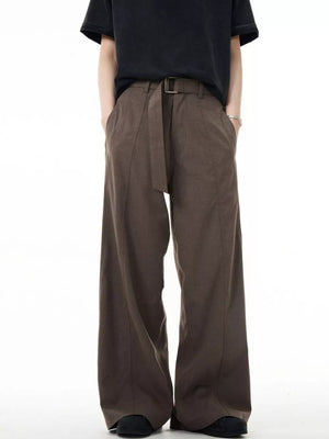 Men's dark brown wide-leg sweatpants with a belted waist and pockets.