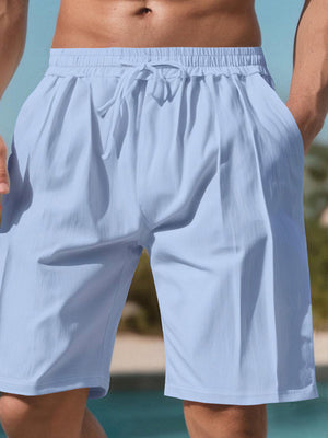 athletic shorts in light blue featuring drawstring waist and relaxed fit