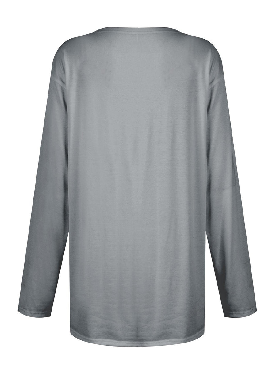 Gray relaxed fit tunic with long sleeves and a crew neck.