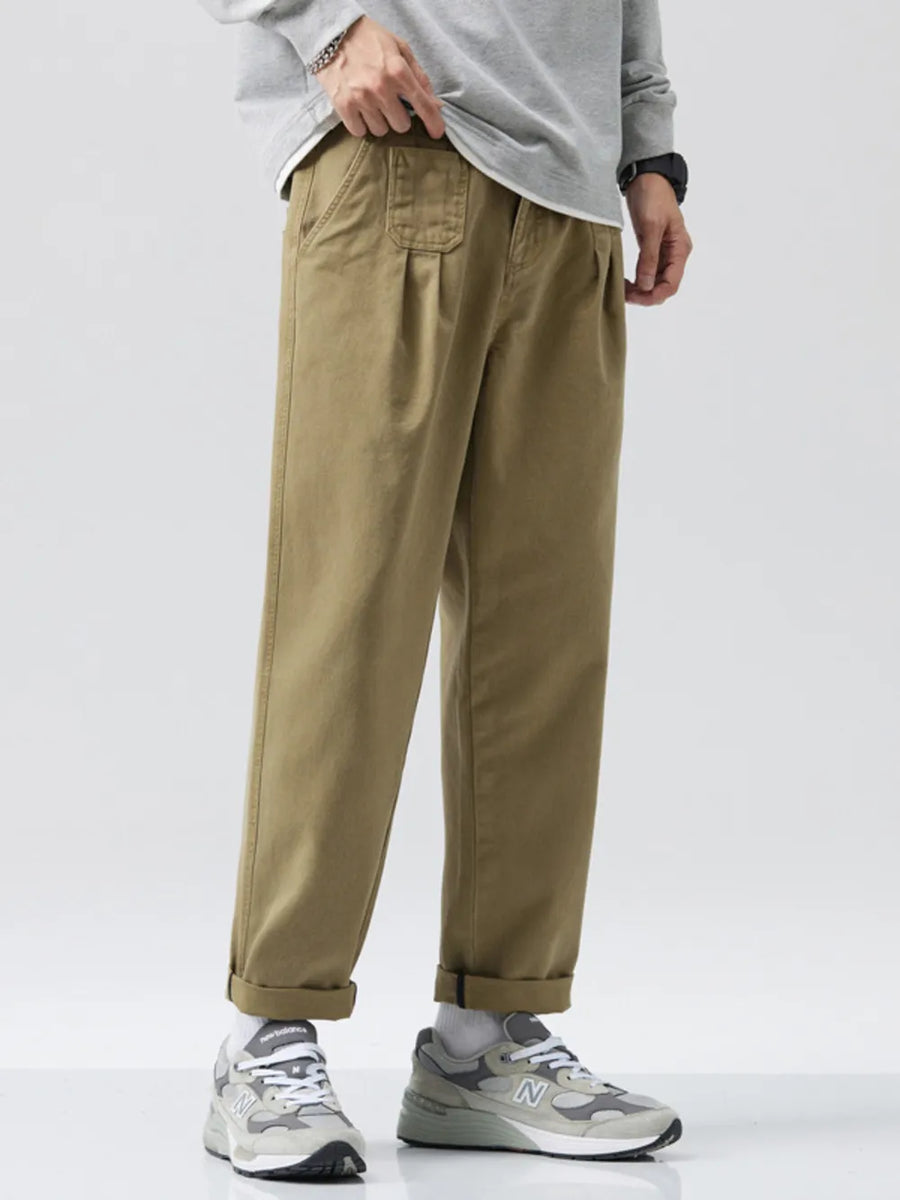 Men's olive relaxed fit sweatpants with drawstring and pockets.