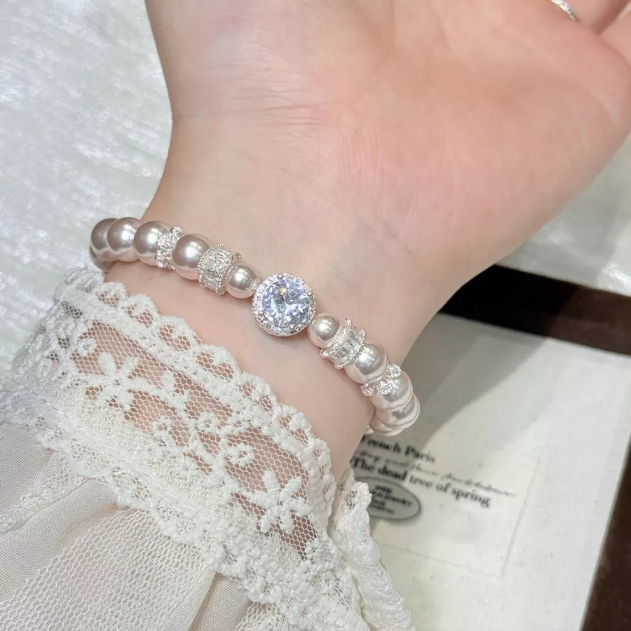 Synthetic Pearl,Alloy,Zircon Care instructions: Avoid wearing during exercise, a bracelet in silver with fitted silhouette
