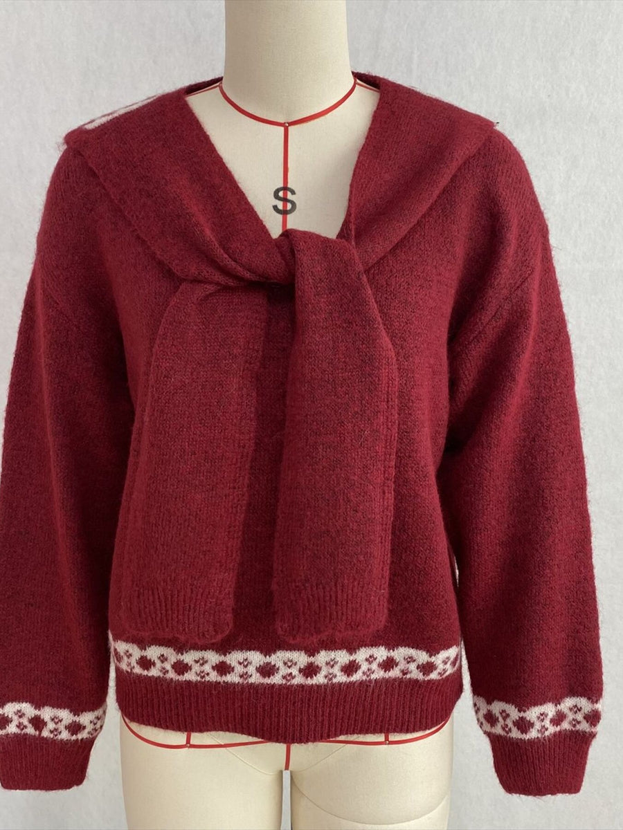 100% polyester Care instructions: Machine wash cold pullover sweater in Brown with relaxed silhouette