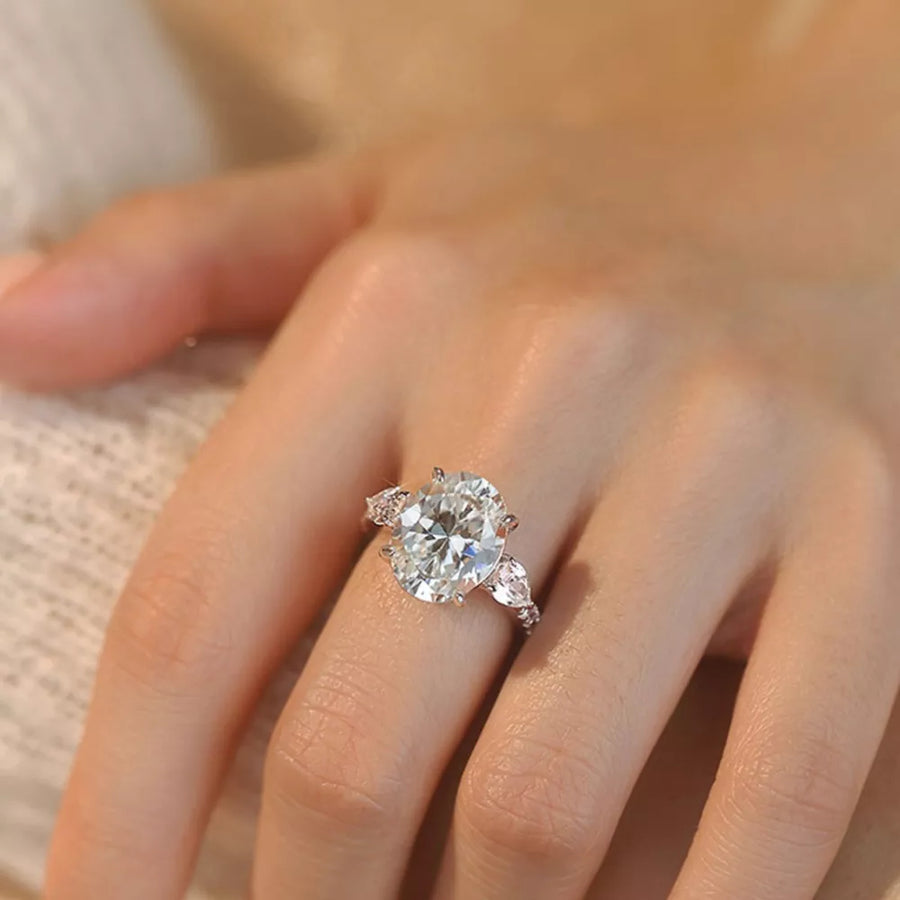 Dazzling Moissanite Oval Ring in Sterling Silver with side marquise stones.