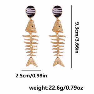 earrings in gold with striped and drop earrings