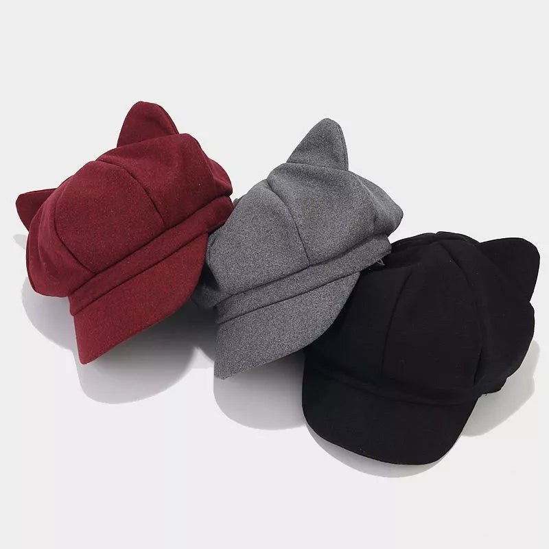 hat in burgundy featuring cat ears and structured fit