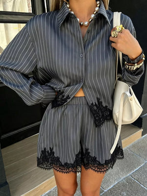 white pajama set featuring buttoned and striped