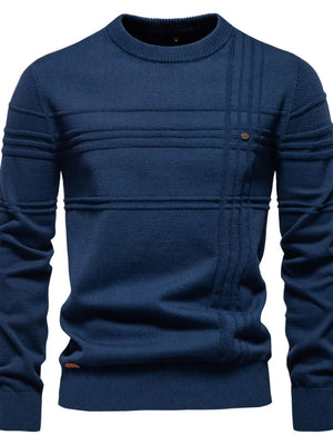 Navy crewneck knit sweater with horizontal and vertical textured panels and a small button detail.