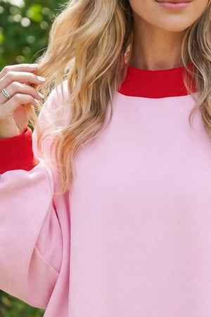 65% polyester, 35% cotton Care instructions: Machine wash cold sweatshirt in light pink with oversized silhouette