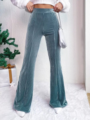 Peacock blue corduroy high-waist flare maternity pants with vertical ribbing.