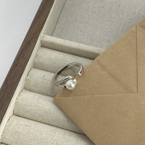 Freshwater Pearl,925 sterling silver Care instructions: Avoid wearing during exe ring in ivory with open cuff silhouette