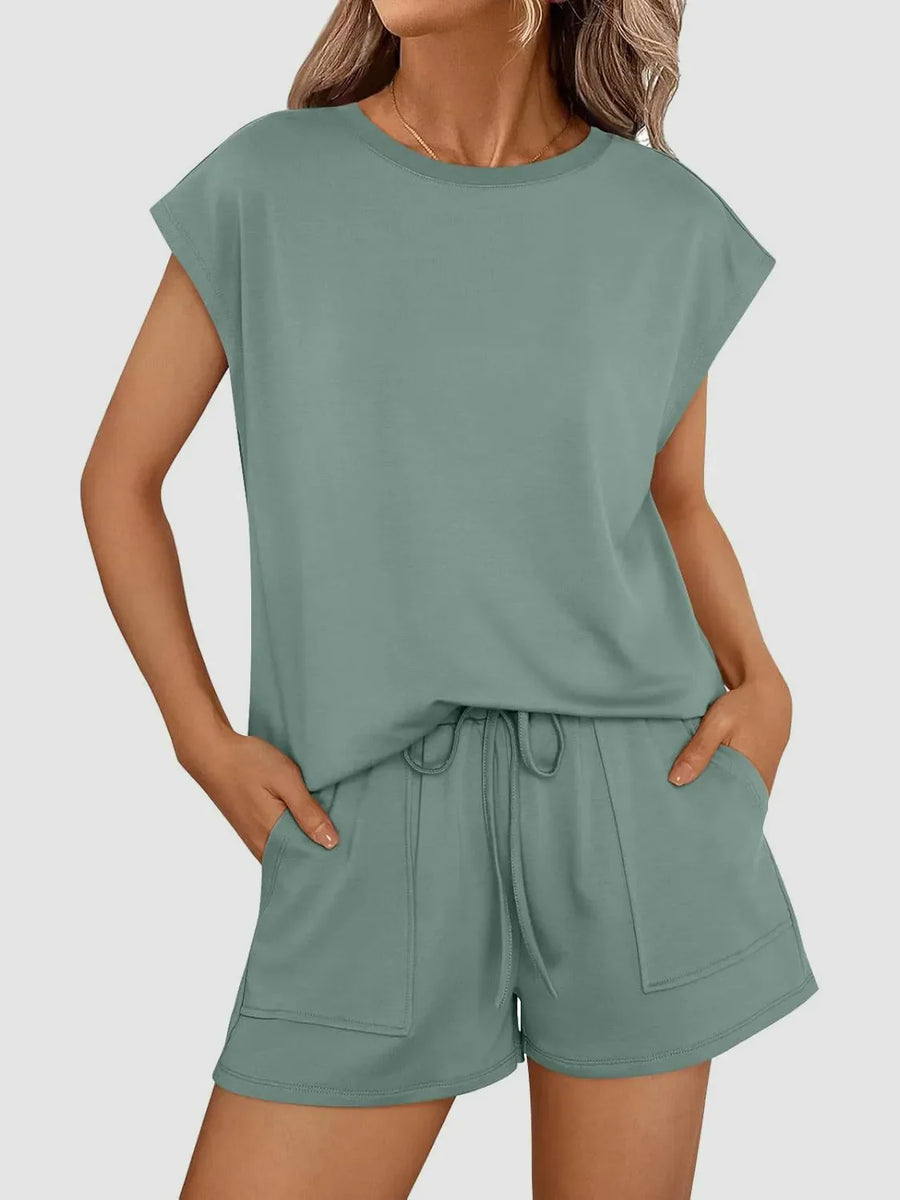 Relaxed fit short set in sage green with drawstring shorts and cap sleeve top.