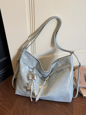 black with handbag with adjustable strap