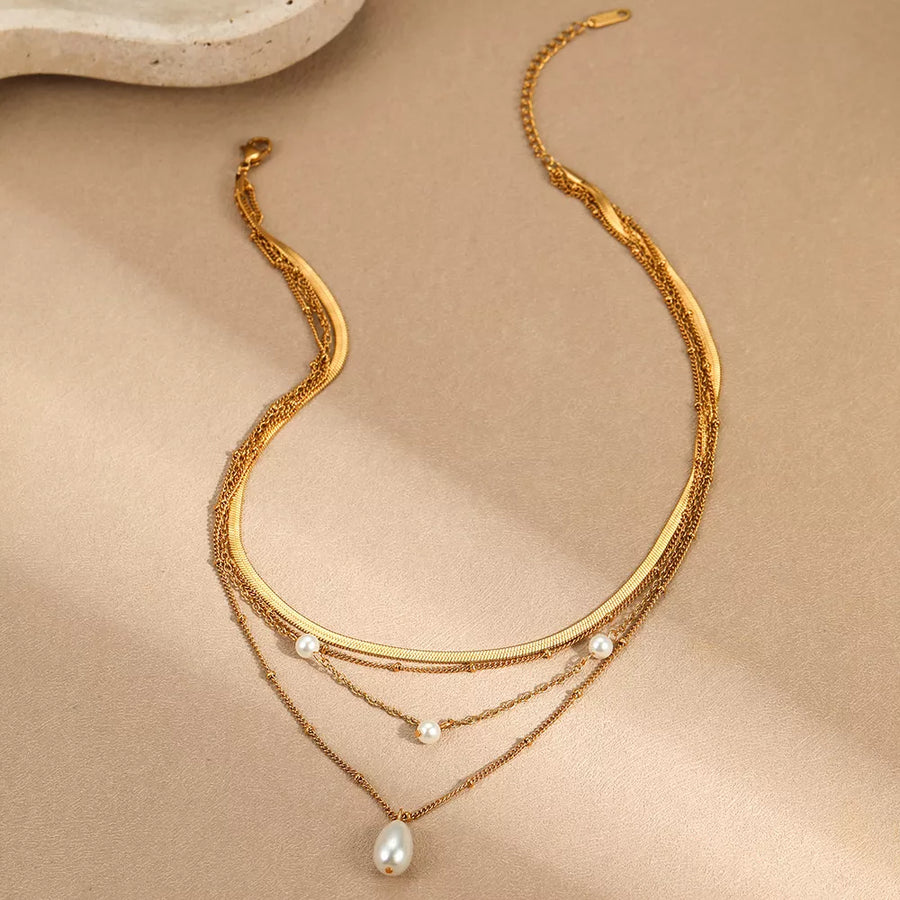Synthetic Pearl,18K Gold-Plated,Stainless Steel Care instructions: Avoid wearing necklace in white with layered silhouette