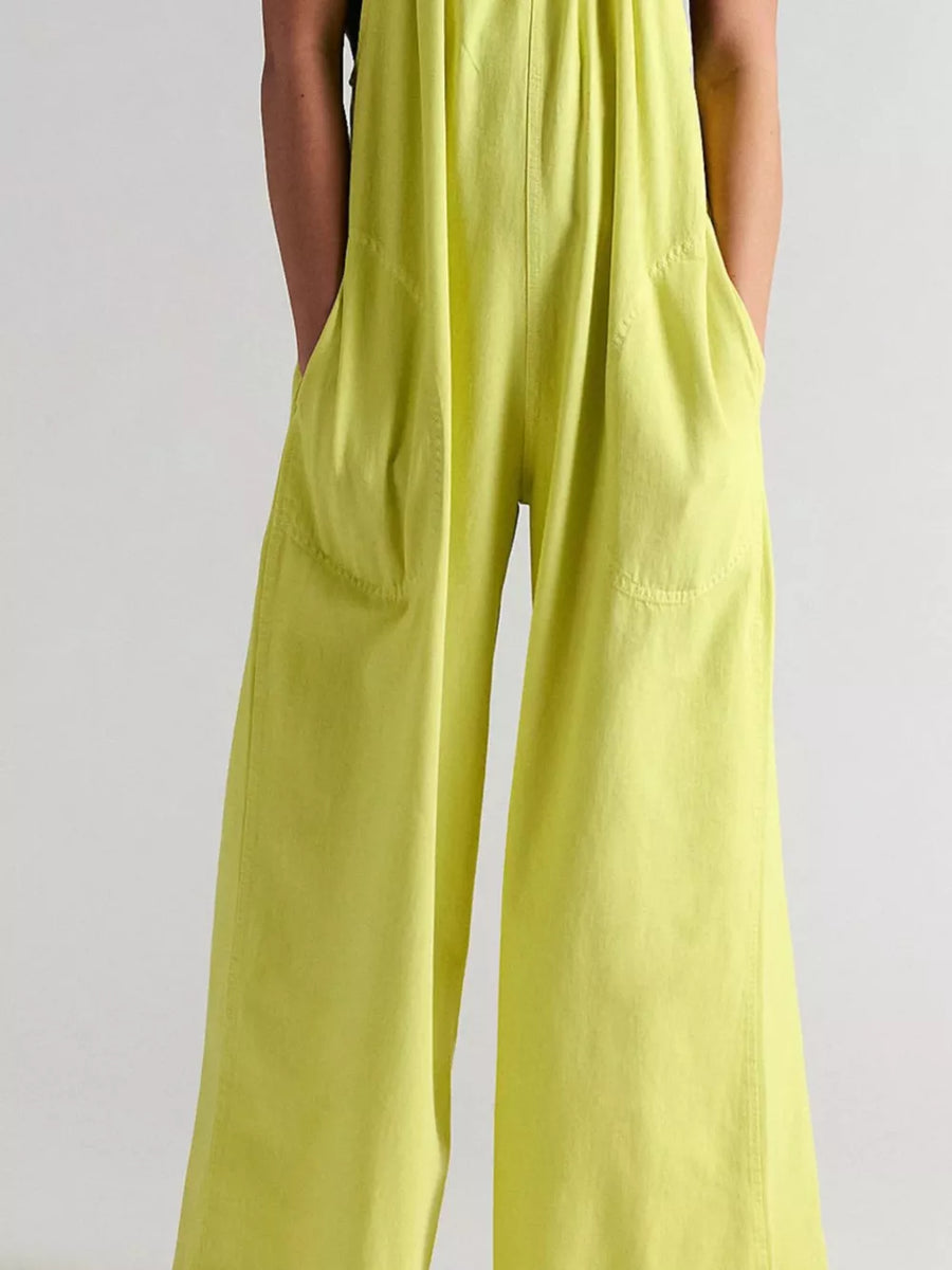 White jumpsuit with gathered neckline and sleeveless