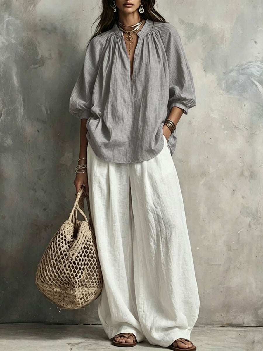 blouse and wide-leg pants set in White with pocketed and hip-length blouse, full-length pants