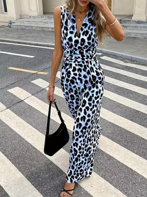 Sleeveless leopard print romper with V-neck and belted waist.