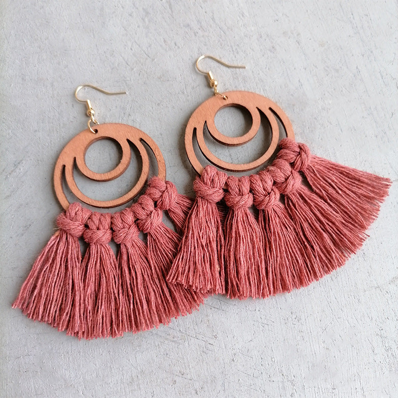 Pink tassel earrings with wooden double hoop detail