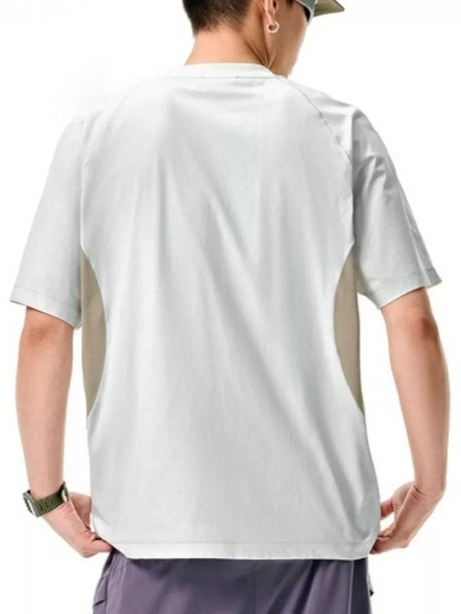 Men's oversized t-shirt with geometric panels in a light neutral color, crew neck, short sleeves.