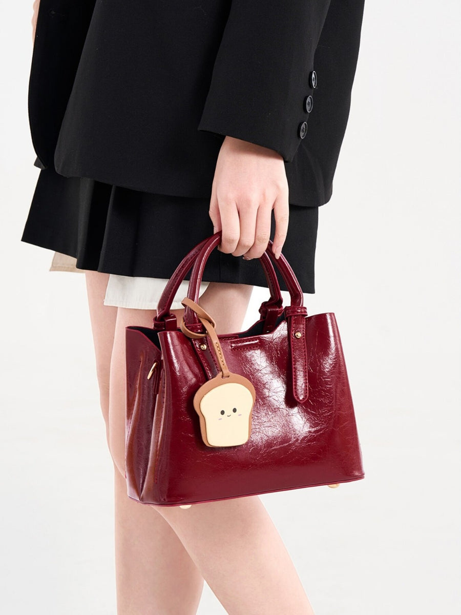 PU Leather Imported Size & handbag in burgundy with structured silhouette