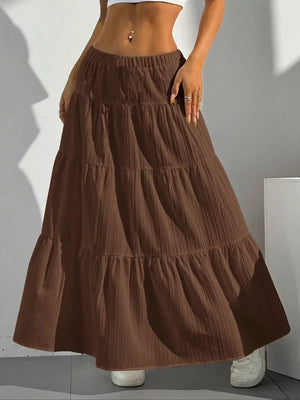 Brown tiered maxi skirt with elastic waistband and textured fabric