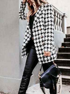 overcoat in black with houndstooth and double-breasted