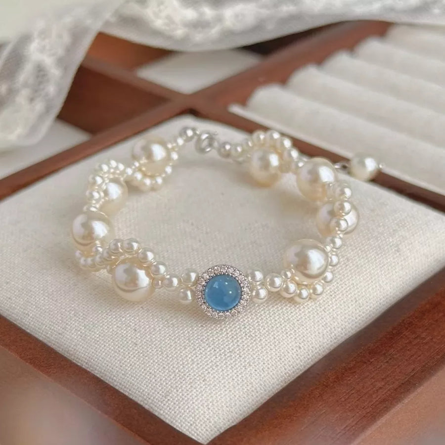 Synthetic Pearl,925 sterling silver,Crystal,Zircon Care instructions: Avoid wear bracelet in Sky Blue with fitted silhouette