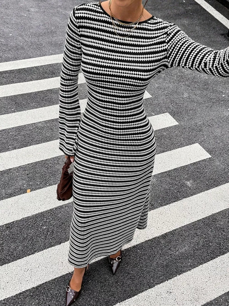 white sweater dress featuring flared sleeves and striped
