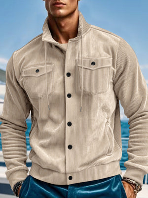 Beige corduroy bomber jacket with black buttons and chest pockets