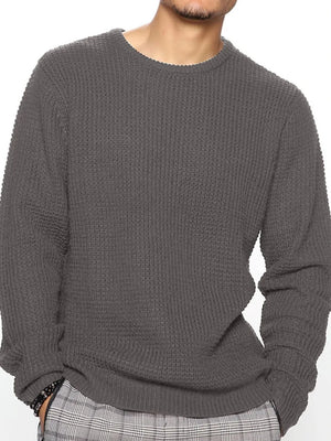 Dark gray waffle knit crewneck sweater with relaxed fit