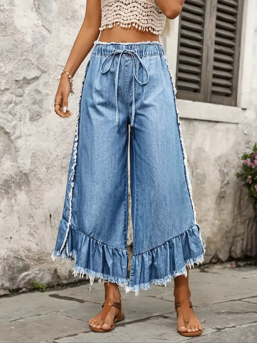 70% cotton, 28% polyester,2% elastane Care instructions: Machine wash cold wide-leg jeans in light wash denim blue with