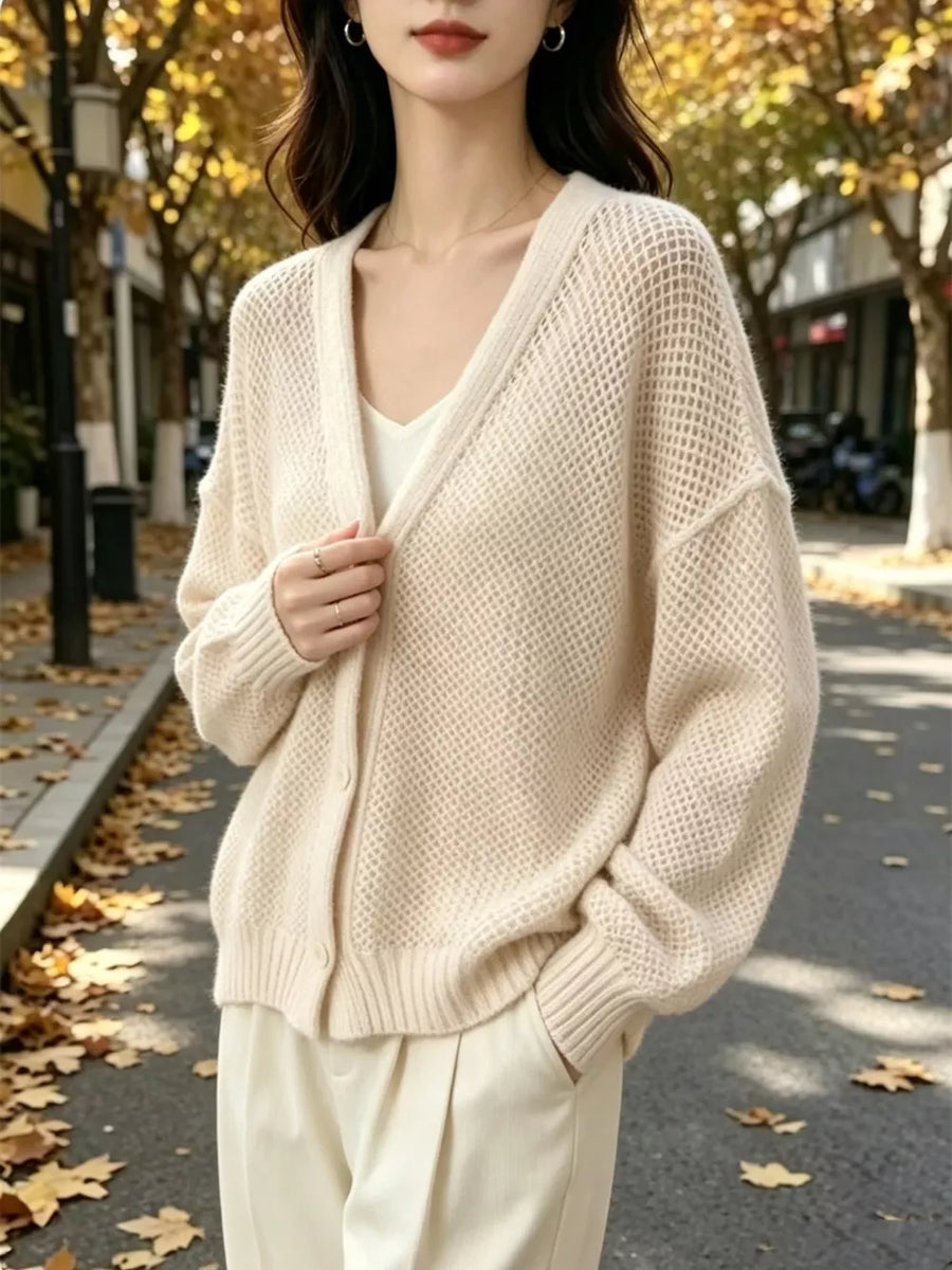 cardigan featuring open-knit in Black with 100% polyester Care instructions: Machine wash cold texture