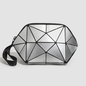 clutch in silver with geometric and metallic