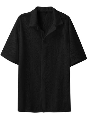 Black crochet resort shirt with geometric pattern, short sleeves, and button-up front.