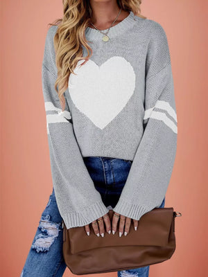 pullover sweater featuring heart-print in Pink with 100% polyester Care instructions: Machine wash cold texture