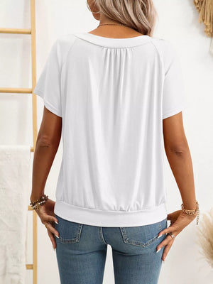 White ruched V-neck t-shirt with short sleeves and banded hem.
