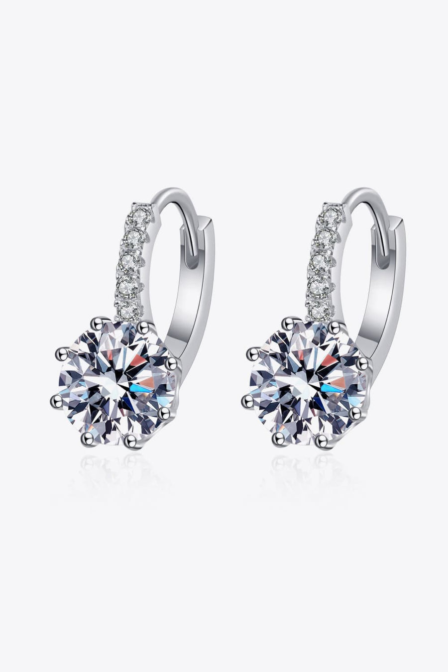 Sterling silver hoop earrings with moissanite halo and large center stone.