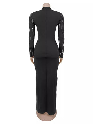 maxi dress in black with rhinestone embellishment and maxi